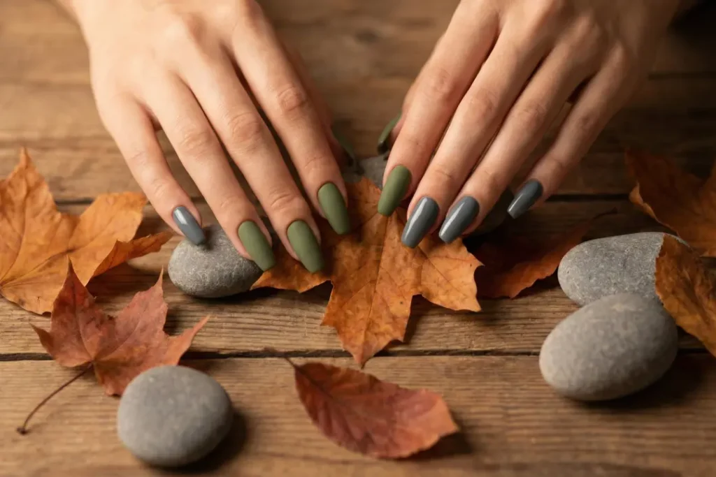 Autumn 2026 nail aesthetic moss and slate flatlay.
